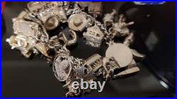 Silver 925 Sterling Silver Charm Bracelet 121 Grams With 39 Charms Silver 925 Sterling Silver Charm Bracelet 121 Grams With 39 Charms