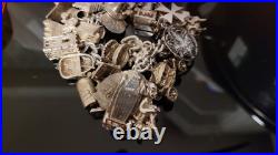 Silver 925 Sterling Silver Charm Bracelet 121 Grams With 39 Charms Silver 925 Sterling Silver Charm Bracelet 121 Grams With 39 Charms