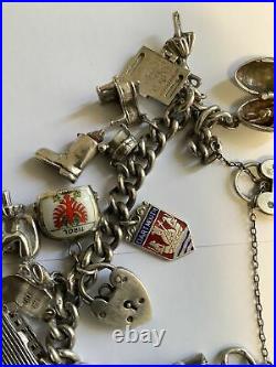 Silver Bracelet With 15 Charms, Some With Moving Parts, Plus Location Tags