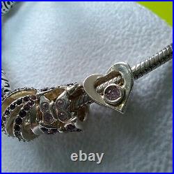Silver Bracelet by Chamilia with Seven Charms including Grey Zebra