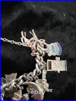 Silver Charm Bracelet 109.60 Grams Over 32 Charms