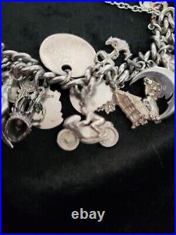 Silver Charm Bracelet 109.60 Grams Over 32 Charms