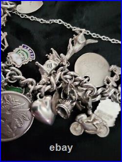 Silver Charm Bracelet 109.60 Grams Over 32 Charms