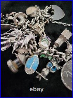 Silver Charm Bracelet 109.60 Grams Over 32 Charms