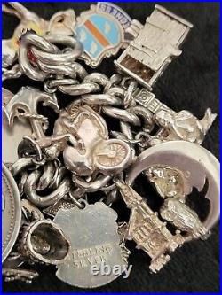 Silver Charm Bracelet 109.60 Grams Over 32 Charms