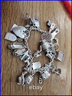 Silver Charm Bracelet With Padlock Clasp And Safety Chain