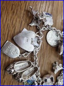 Silver Charm Bracelet With Padlock Clasp And Safety Chain
