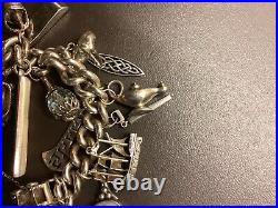 Silver Charm Bracelet with 18 Charms + Lock + Chain. 171.48g