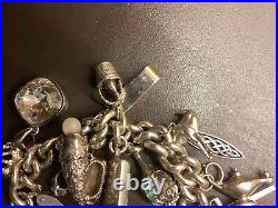 Silver Charm Bracelet with 18 Charms + Lock + Chain. 171.48g