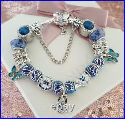 Silver Pandora Bracelet Butterfly Clasp + Charms Shown + Pandora Box. 19 cms Silver Pandora Bracelet Butterfly Clasp + Charms Shown + Pandora Box. 19 cms