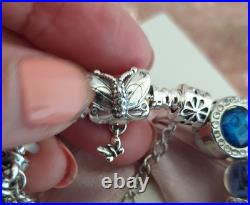 Silver Pandora Bracelet Butterfly Clasp + Charms Shown + Pandora Box. 19 cms Silver Pandora Bracelet Butterfly Clasp + Charms Shown + Pandora Box. 19 cms
