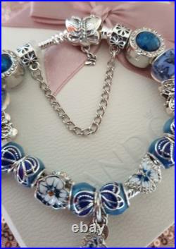 Silver Pandora Bracelet Butterfly Clasp + Charms Shown + Pandora Box. 19 cms Silver Pandora Bracelet Butterfly Clasp + Charms Shown + Pandora Box. 19 cms
