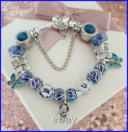 Silver Pandora Bracelet Butterfly Clasp + Charms Shown + Pandora Box. 19 cms Silver Pandora Bracelet Butterfly Clasp + Charms Shown + Pandora Box. 19 cms