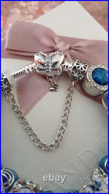 Silver Pandora Bracelet Butterfly Clasp + Charms Shown + Pandora Box. 19 cms Silver Pandora Bracelet Butterfly Clasp + Charms Shown + Pandora Box. 19 cms