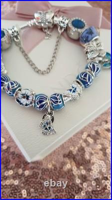 Silver Pandora Bracelet Butterfly Clasp + Charms Shown + Pandora Box. 19 cms Silver Pandora Bracelet Butterfly Clasp + Charms Shown + Pandora Box. 19 cms