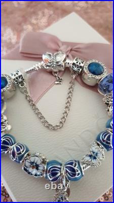 Silver Pandora Bracelet Butterfly Clasp + Charms Shown + Pandora Box. 19 cms Silver Pandora Bracelet Butterfly Clasp + Charms Shown + Pandora Box. 19 cms