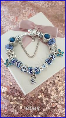 Silver Pandora Bracelet Butterfly Clasp + Charms Shown + Pandora Box. 19 cms Silver Pandora Bracelet Butterfly Clasp + Charms Shown + Pandora Box. 19 cms