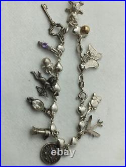 Silver Total of 25 Charms Heart Bracelet Rare Vintage Silver Total of 25 Charms Heart Bracelet Rare Vintage