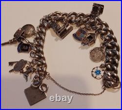 Silver charm bracelet 95.47g Silver Many Interesting Charms Making It Unique