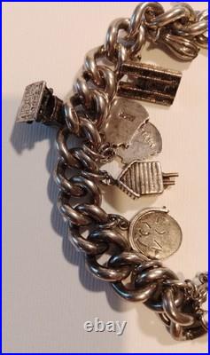 Silver charm bracelet 95.47g Silver Many Interesting Charms Making It Unique