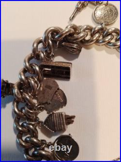 Silver charm bracelet 95.47g Silver Many Interesting Charms Making It Unique