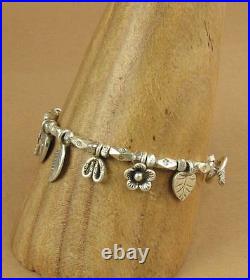 Silver charm bracelet. Leaf, flower, dragonfly, heart. Fine & sterling silver 925