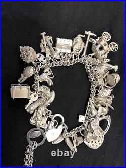 Silver charm bracelet with 44 Silver charms