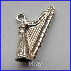 Silver charm of a harp perfect for a traditional charm bracelet