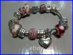 Silver pandora bracelet with approx 18 charms, total weight 58gms