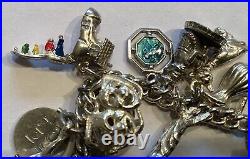 Solid Silver Charm Bracelet with 27 Wonderful Charms. Beautiful Vintage Piece