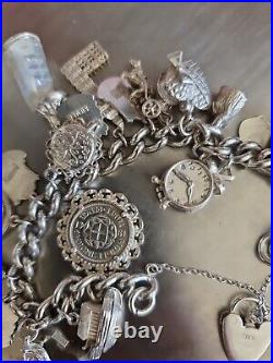 Solid Silver Heavy Charm Bracelet Lots of Interesting Charms. 83 Grams