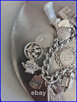 Solid Silver Heavy Charm Bracelet Lots of Interesting Charms. 83 Grams