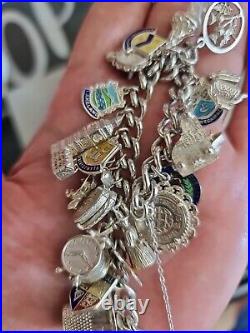 Solid Silver Heavy Charm Bracelet Lots of Interesting Charms. 83 Grams