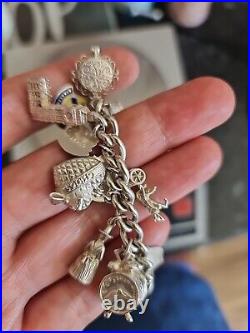 Solid Silver Heavy Charm Bracelet Lots of Interesting Charms. 83 Grams