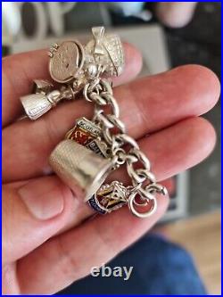 Solid Silver Heavy Charm Bracelet Lots of Interesting Charms. 83 Grams