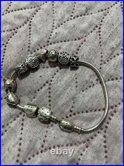 Solid silver charm bracelet with charms