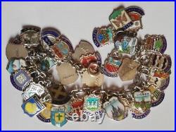Solid silver vintage charm bracelet 44 enamel travel shields 59 Grams