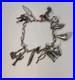 Southwestern-Native-American-Theme-Sterling-Silver-Charm-Bracelet-01-tbdo
