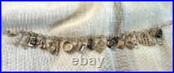 Sterling Silver. 925 charm bracelet with 21 kitchen themn charms 8.5