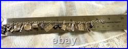 Sterling Silver. 925 charm bracelet with 21 kitchen themn charms 8.5