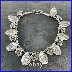 Sterling Silver Bracelet with Rose Flower and Leaf Charms Nomads Wales