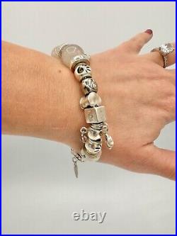 Sterling Silver Chamilia Charm Bracelet including 23 Silver Charms refdan131