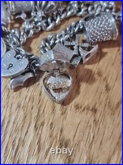 Sterling Silver Charm Bracelet 12 Charms. Car Compass Ring 65g Please See Info