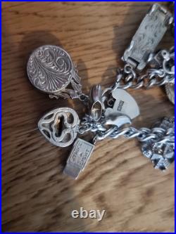 Sterling Silver Charm Bracelet 12 Charms. Car Compass Ring 65g Please See Info