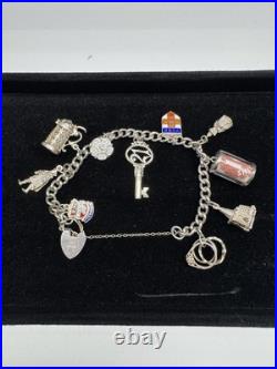 Sterling Silver Charm Bracelet with 10 Charms