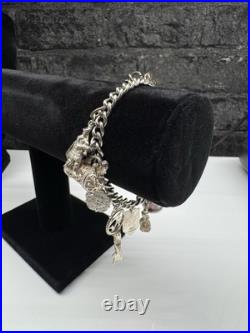 Sterling Silver Charm Bracelet with 10 Charms