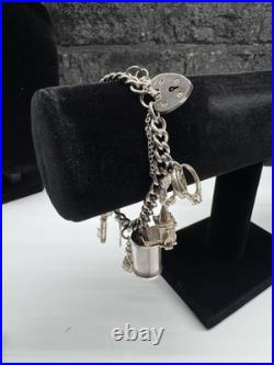 Sterling Silver Charm Bracelet with 10 Charms