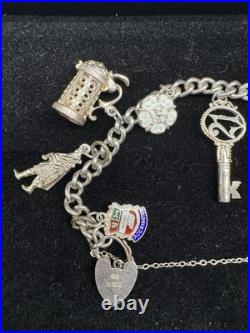 Sterling Silver Charm Bracelet with 10 Charms