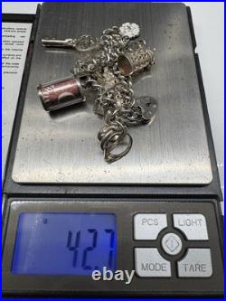 Sterling Silver Charm Bracelet with 10 Charms