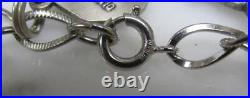 Sterling Silver Charm Bracelet with 12 Charms 7 47grams 7-G557 Sterling Silver Charm Bracelet with 12 Charms 7 47grams 7-G557
